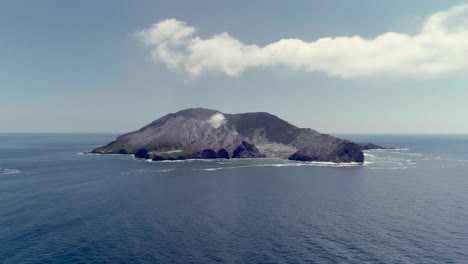 white island in pacific ocean, active volcano that erupted in 2019, aerial