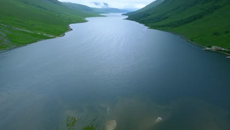 Drone-shot-reveals-Glen-Etive-in-between-mountain-peaks