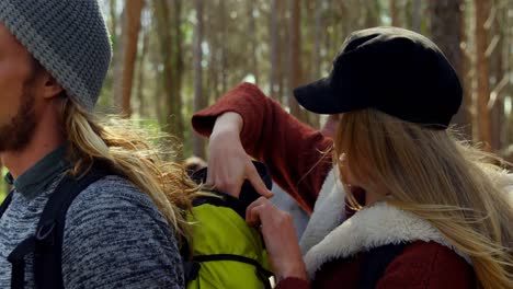 young couple camping in the forest on sunny day 4k