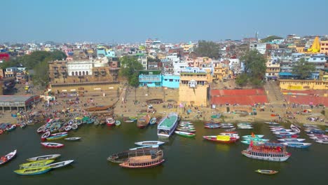 AERIAL-view-of-Dashashwamedh-Ghat,-Kashi-Vishwanath-Temple-and-Manikarnika-Ghat-Manikarnika-Mahashamshan-Ghat-Varanasi-India