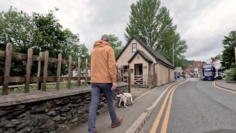 people walking along a street in llangollen