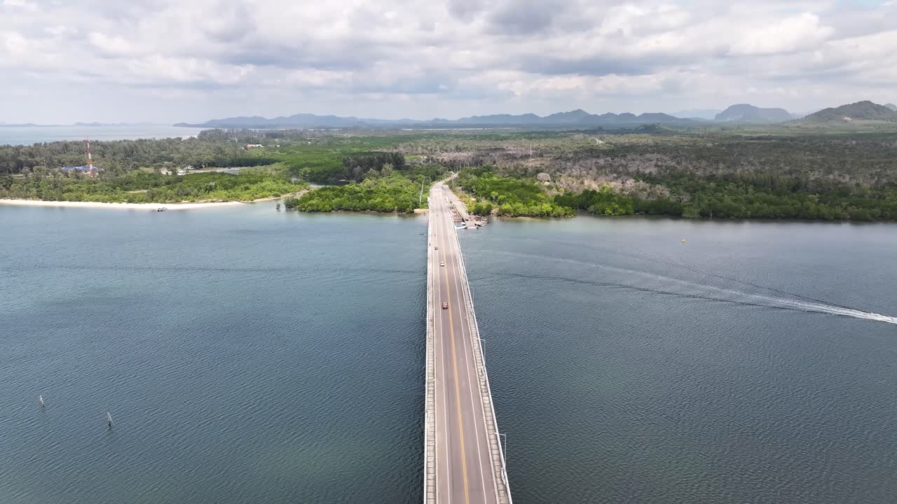 Siri Lanta Bridge And Ferry Terminal In Sala Dan, Ko Lanta District, Krabi, Thailand. Aerial Pullback Shot