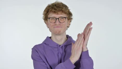 clapping by redhead young man, white background