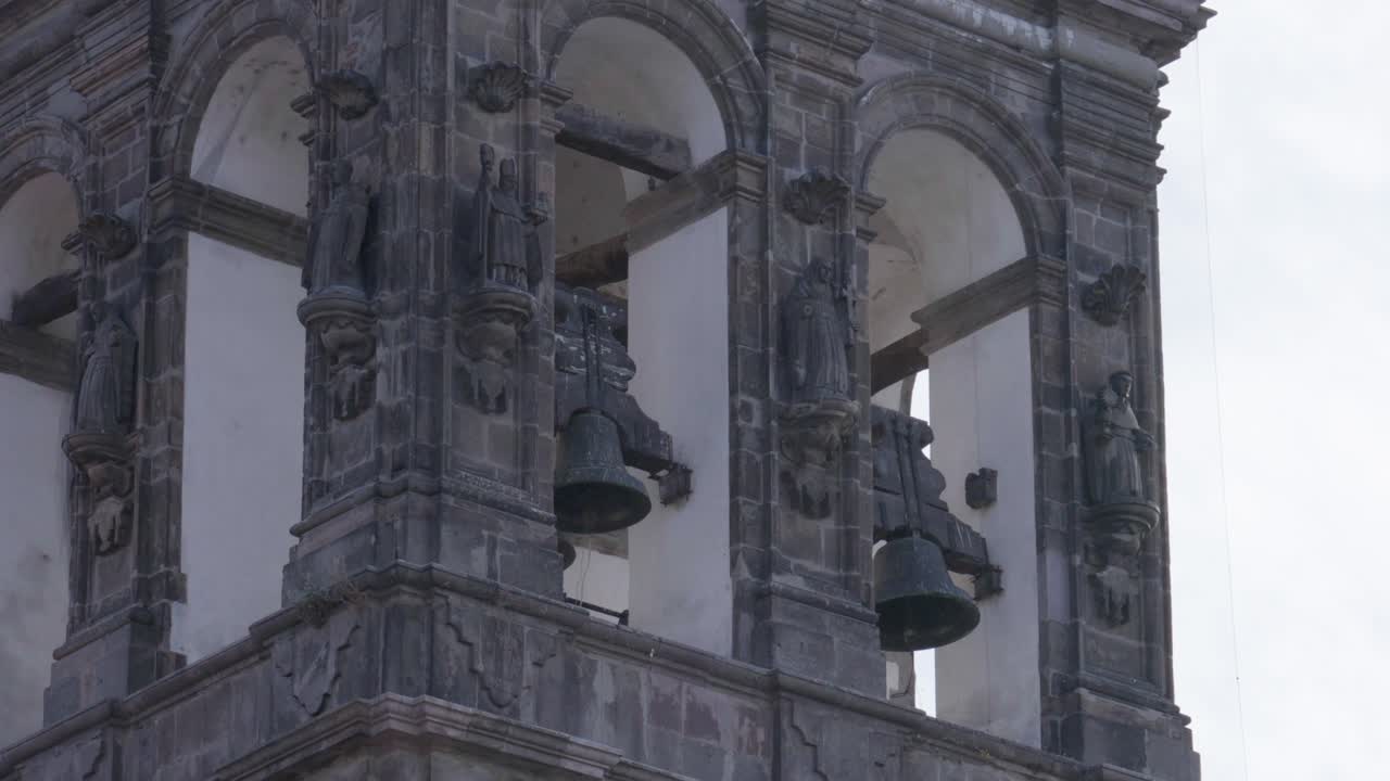 The bell tower of an old-style Catholic temple