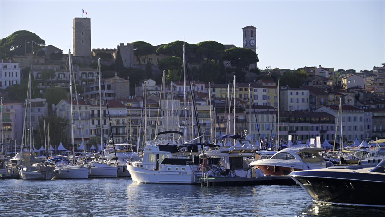 Cannes, France - June 22, 2025: Multiple boats docked in the Cannes harbour in daylight
