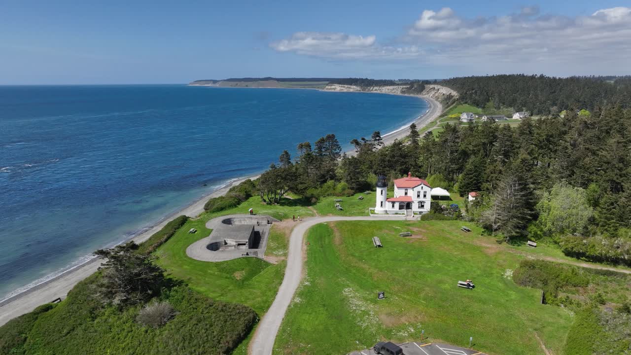 Drone shot of Whidbey Island's lighthouse overlooking the Puget Sound.