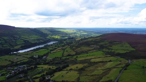 Aerial-Orbiting-Shot-of-Beautiful-Irish-Pastures-in-the-Mountains