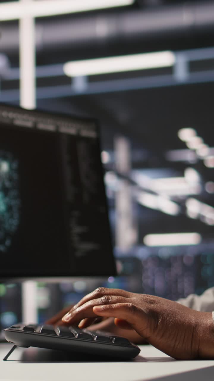 Vertical video Close up of data center admin coding, writing script on PC