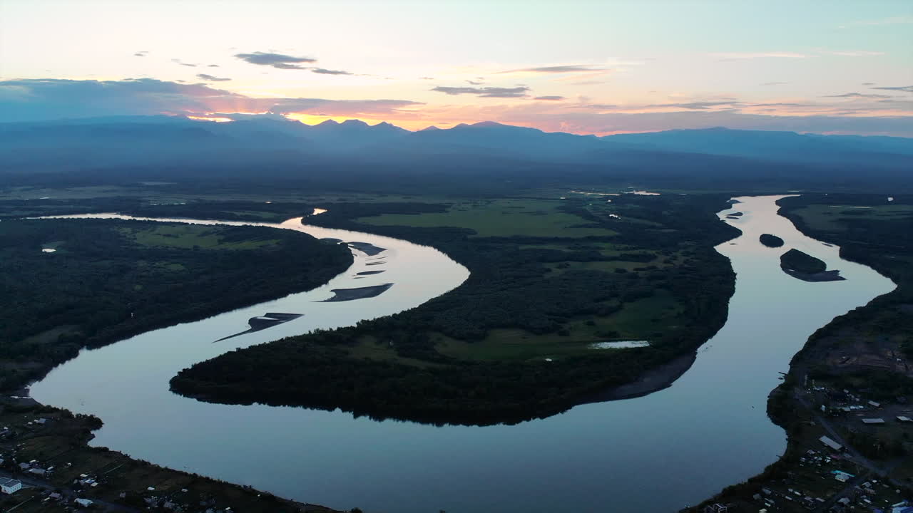 Aerial view of a river at sunset