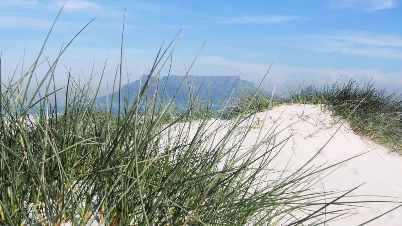 Table Mountain from across a calm Table Bay on a perfect morning with a gentle breeze.