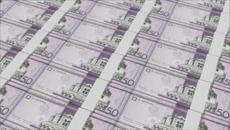 billetes de 50 pesos dominicanos impresos por una prensa de dinero