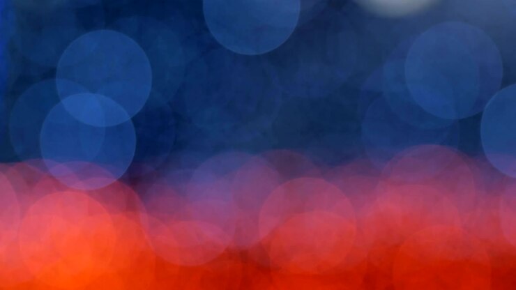 Night abstract background is defocused with nice bokeh. Blurred Christmas Lights Bokeh. Pan across blur .
