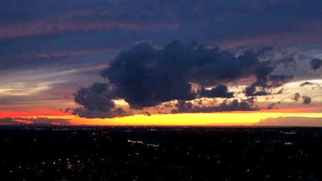 An-aerial-timelapse-of-the-colorful-sky-as-the-sun-sets