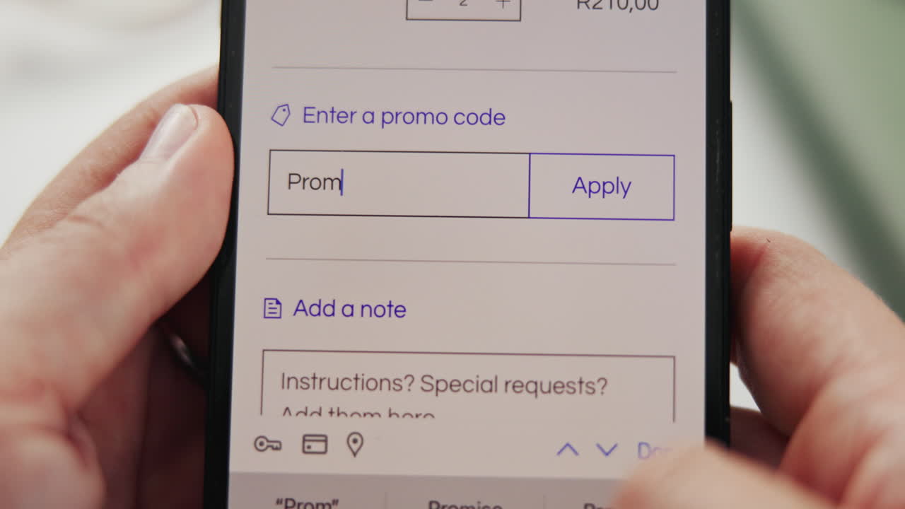 Entering a promo code on a smartphone