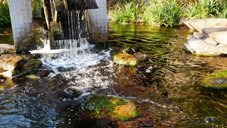water turbines are working to add oxygen to the water in the pond
