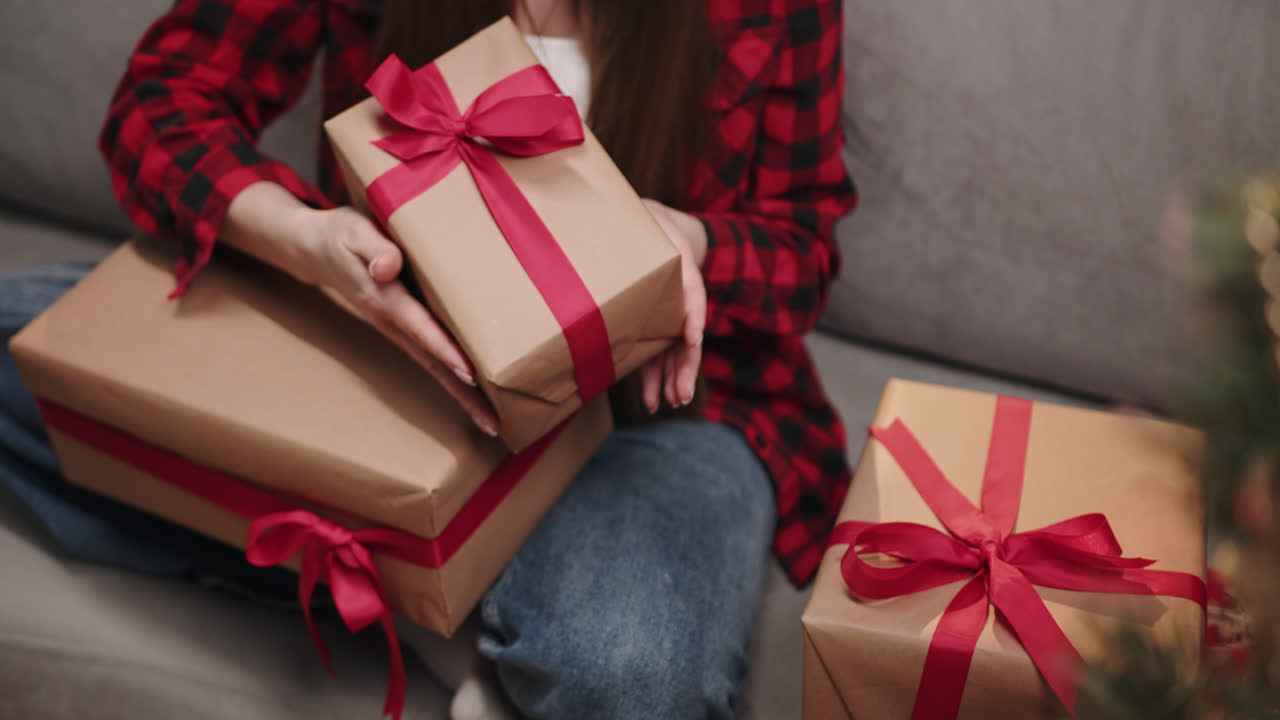 Gifts wrapped with red ribbon