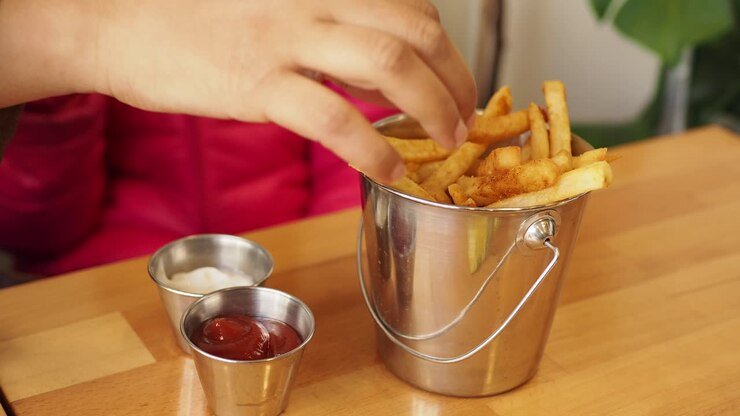 Child Eating French Fries