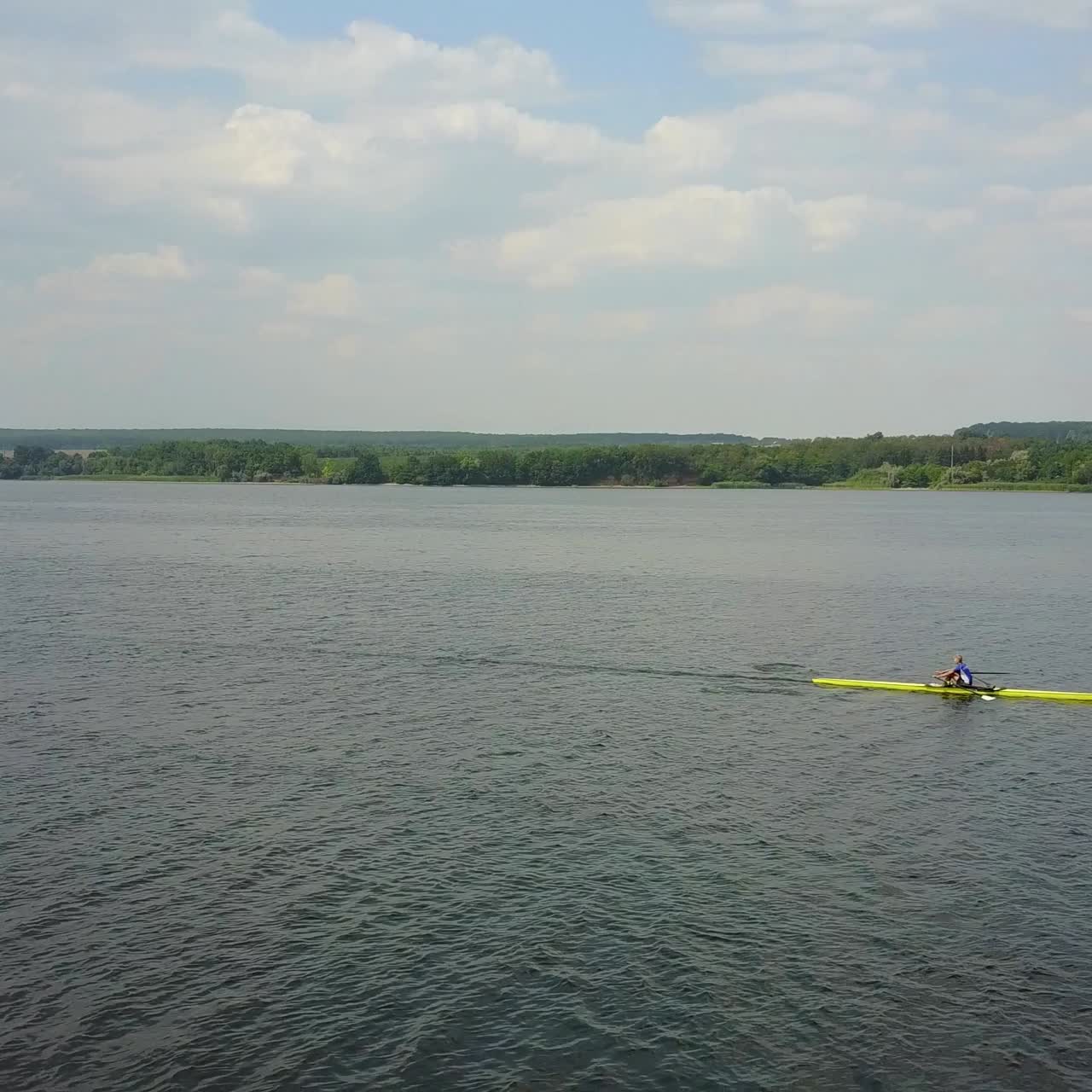 Athletes Training On Kayaks. Group of young athletes training for whitewater rafting