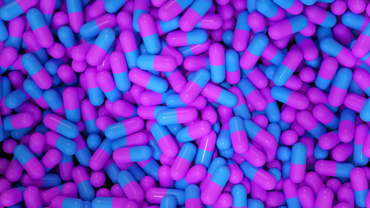 Pile of Purple and Blue Capsules