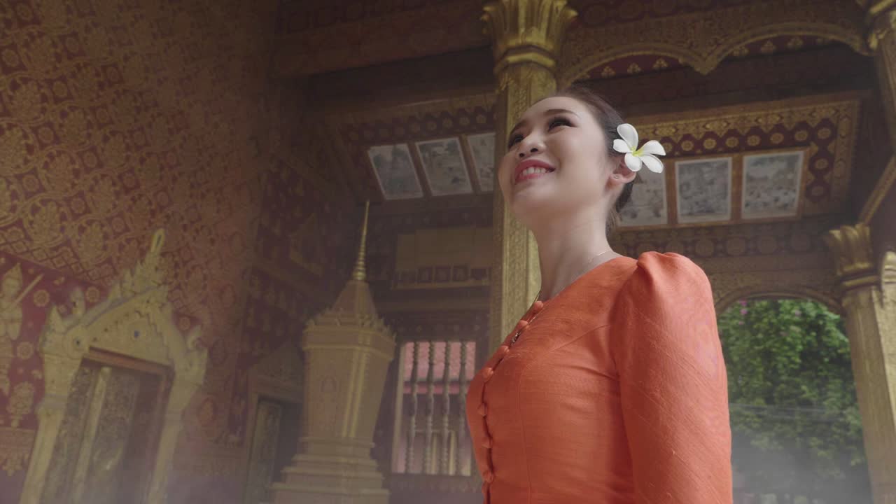 Asian Girl Wearing Traditional Dress In The Temple, Slow Motion