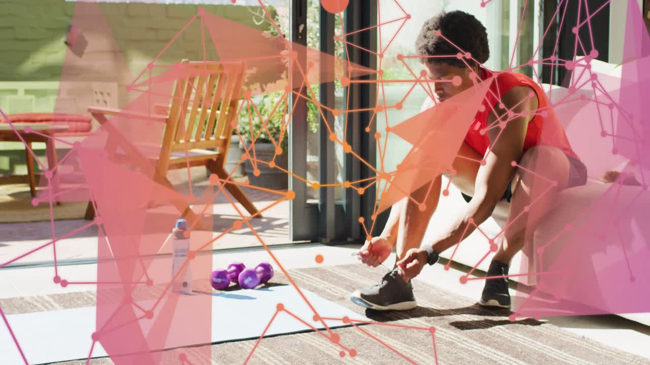 Man leaning, adjusting shoe and testing fit, prepping workout, overlay obscuring frame showing mat