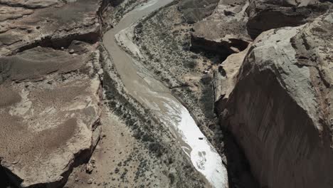 base jumper in parachute gliding to land near salt lake city in utah