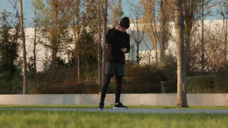 Man-Getting-Ready-For-His-Morning-Run,-Wide-Shot