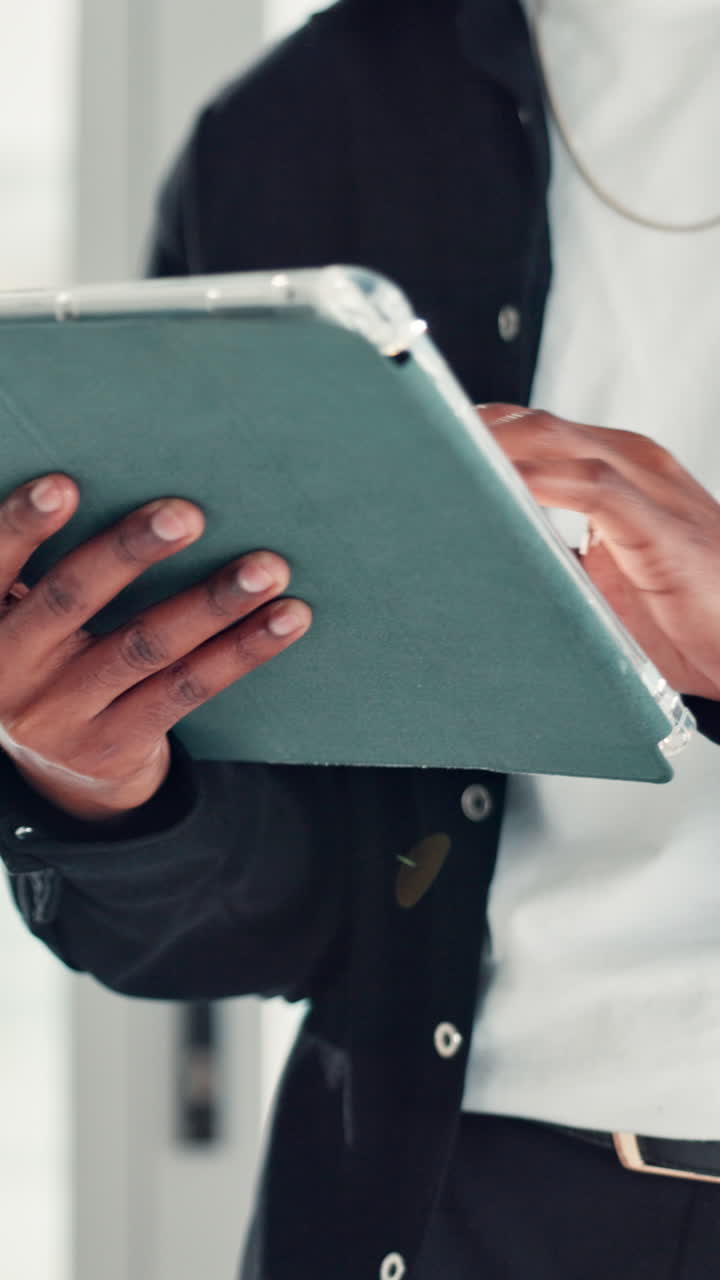 Close-up of Hands Scrolling and Typing on a Digital Tablet