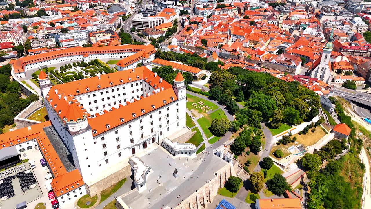 Scenic view on the famous Bratislava Castle in the old town. Drone flight over the territory of the landmark on sunny day