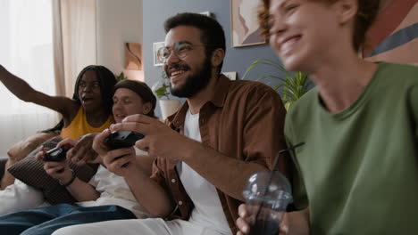 friends enjoying a fun video game session on the couch