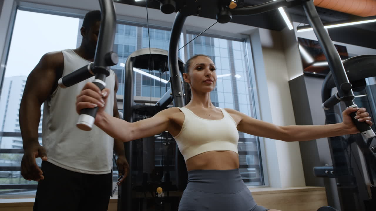 Woman working out with a personal trainer