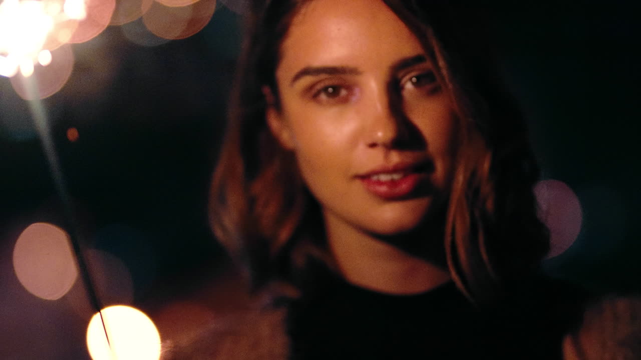 Woman, face or sparkler in night party