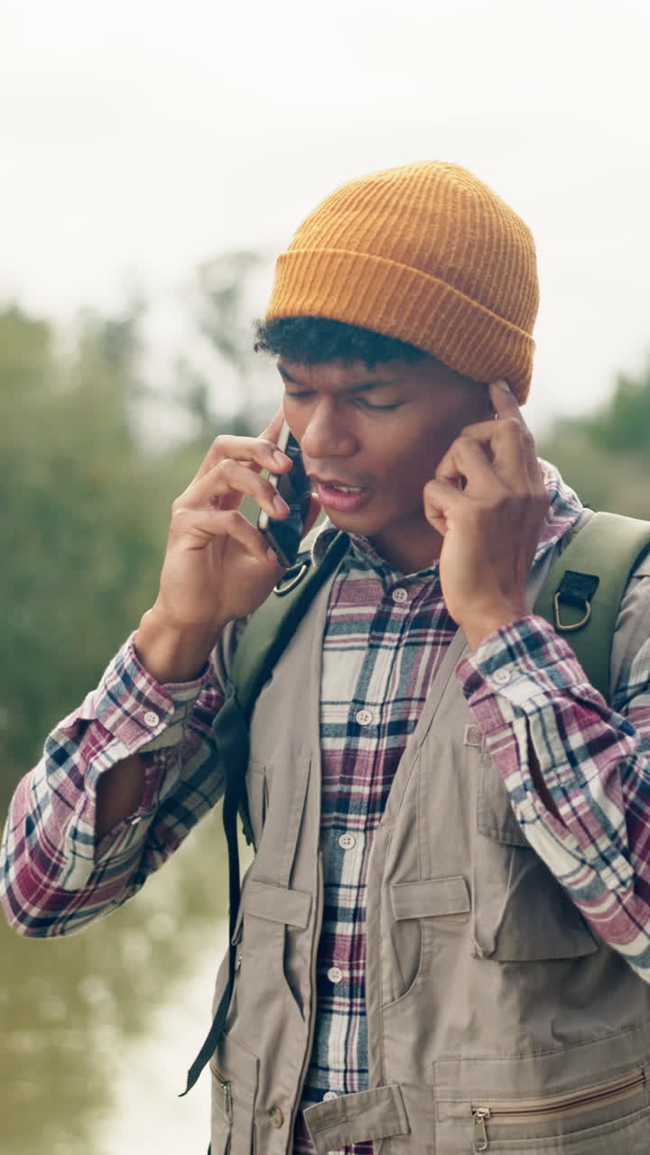 Man talking on cell phone outdoors