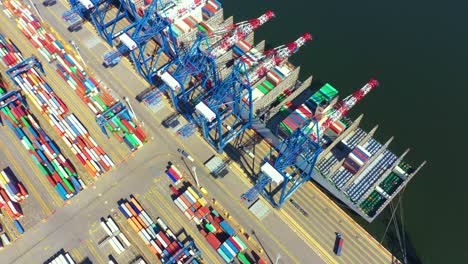 Aerial top view container cargo ship, in import export business logistic and transportation by container ship international open sea