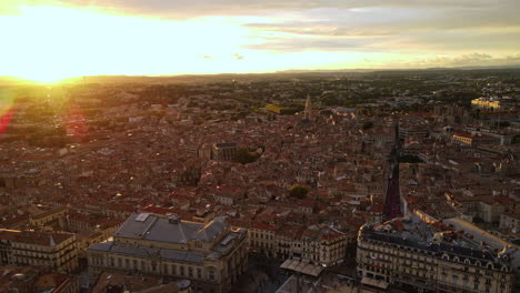 a magical moment captured: montpellier's cityscape under the golden sunset