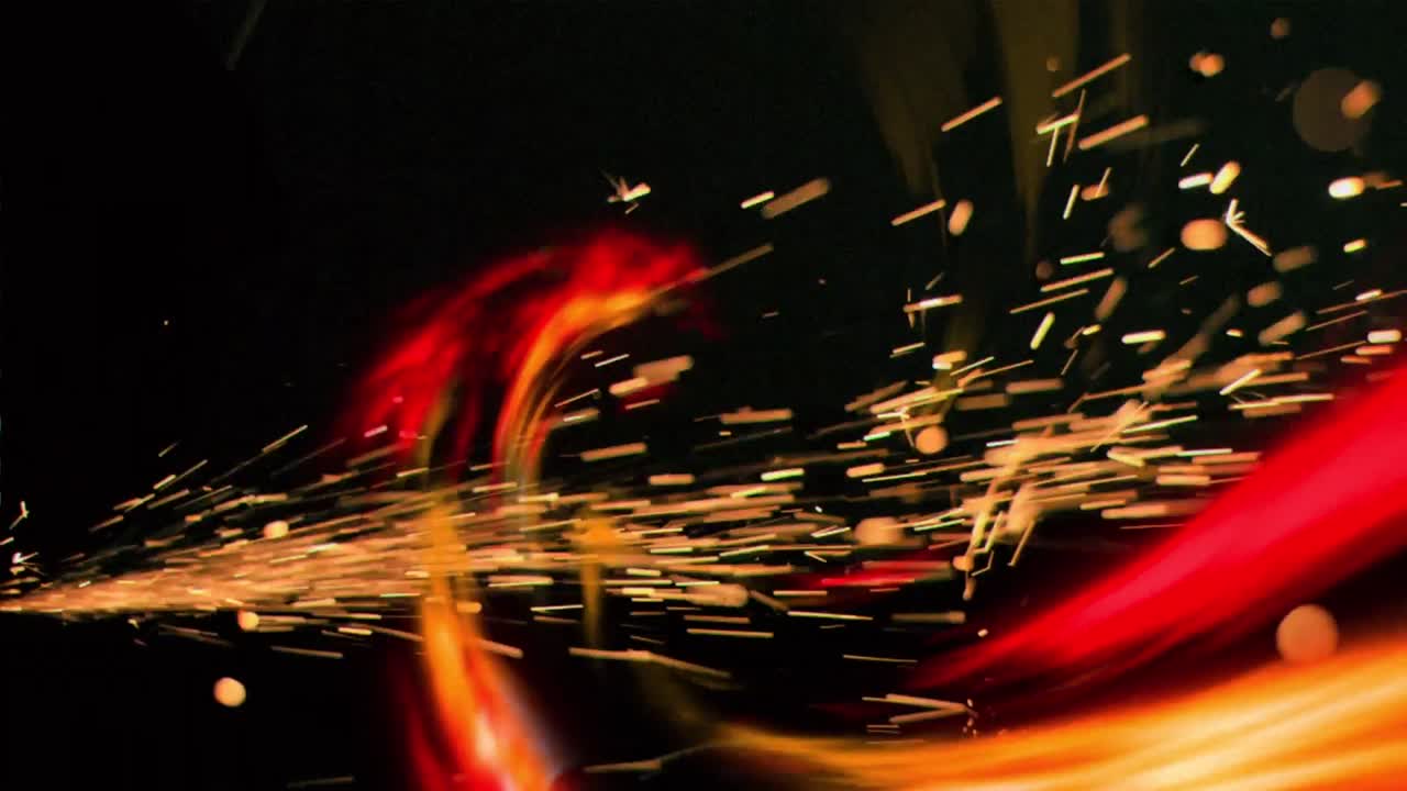 Animation of spiral of orange light over yellow sparks on black background