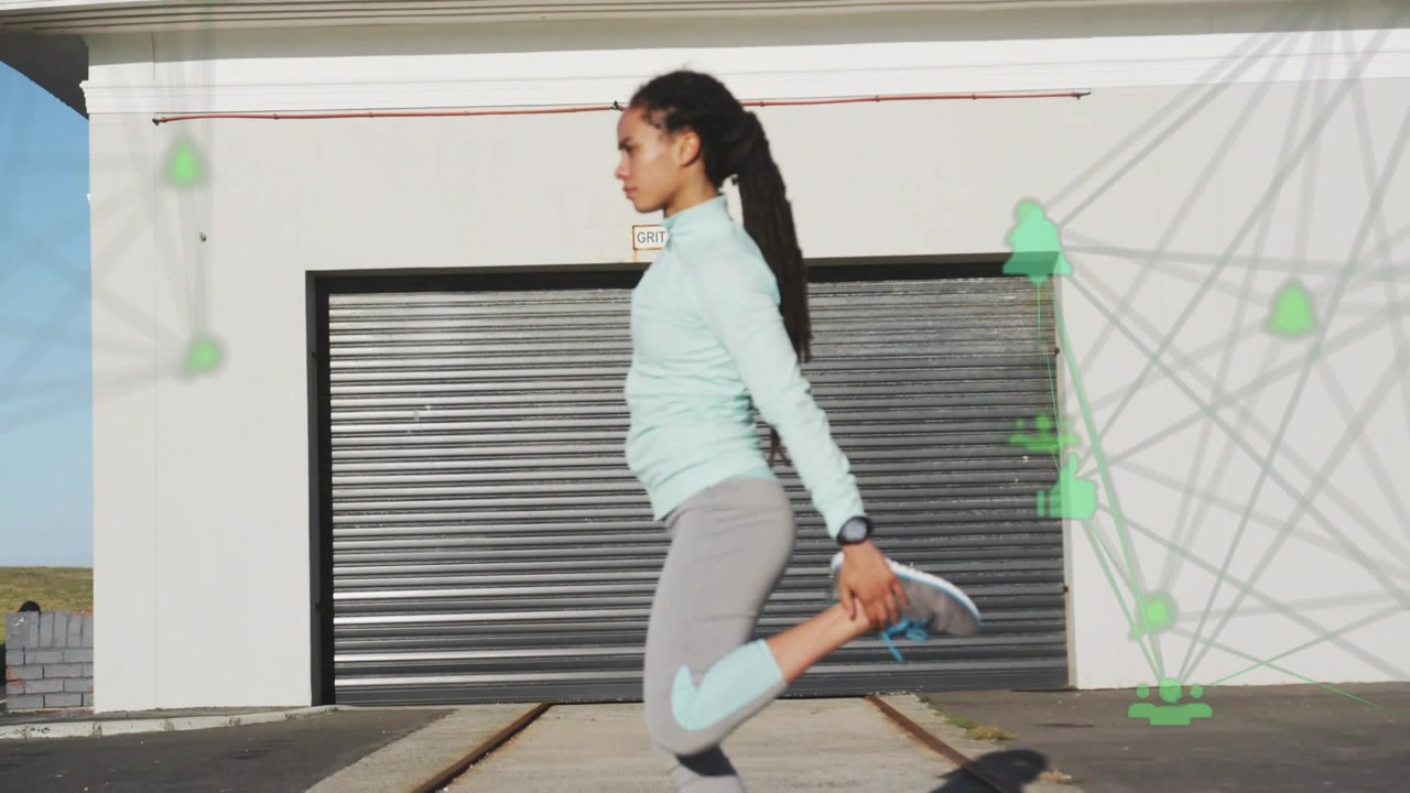 Vertical video: Warming up teal-top woman pulling ankle by garage with overlay preparing for run