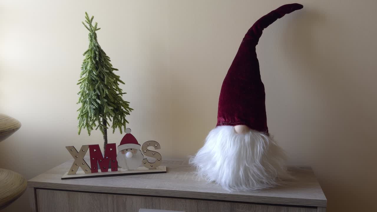 Beautiful Christmas Decoration Of Bearded Dwarf With Red Hat And Small Tree