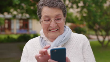 Phone,-backyard-and-senior-woman-on-social-media