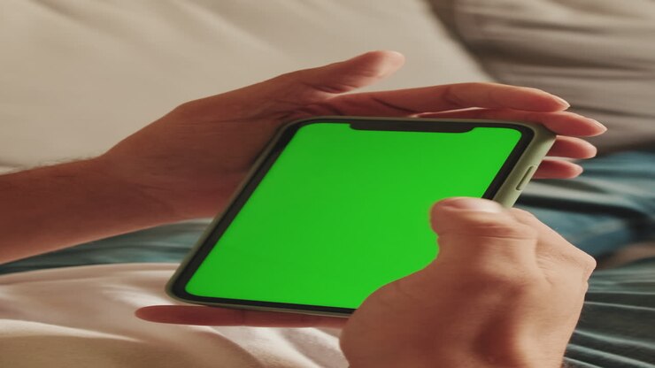 Smartphone con schermo verde