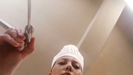 female chef preparing food