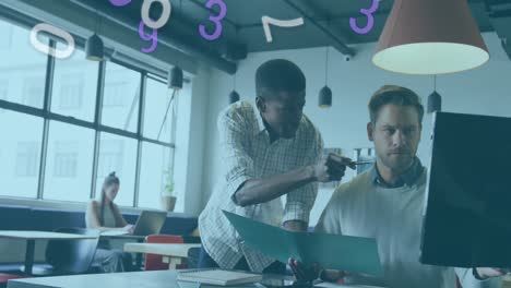 animation of changing numbers over diverse coworkers discussing reports on desktop in office