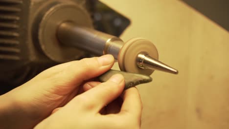 Polishing-green-stone-from-New-Zealand-with-disc-polisher-in-slow-motion