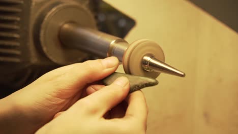 polishing green stone from new zealand with disc polisher in slow motion