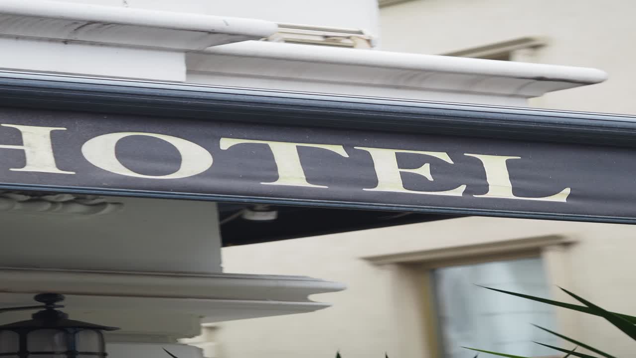 Hotel Sign on Building Exterior