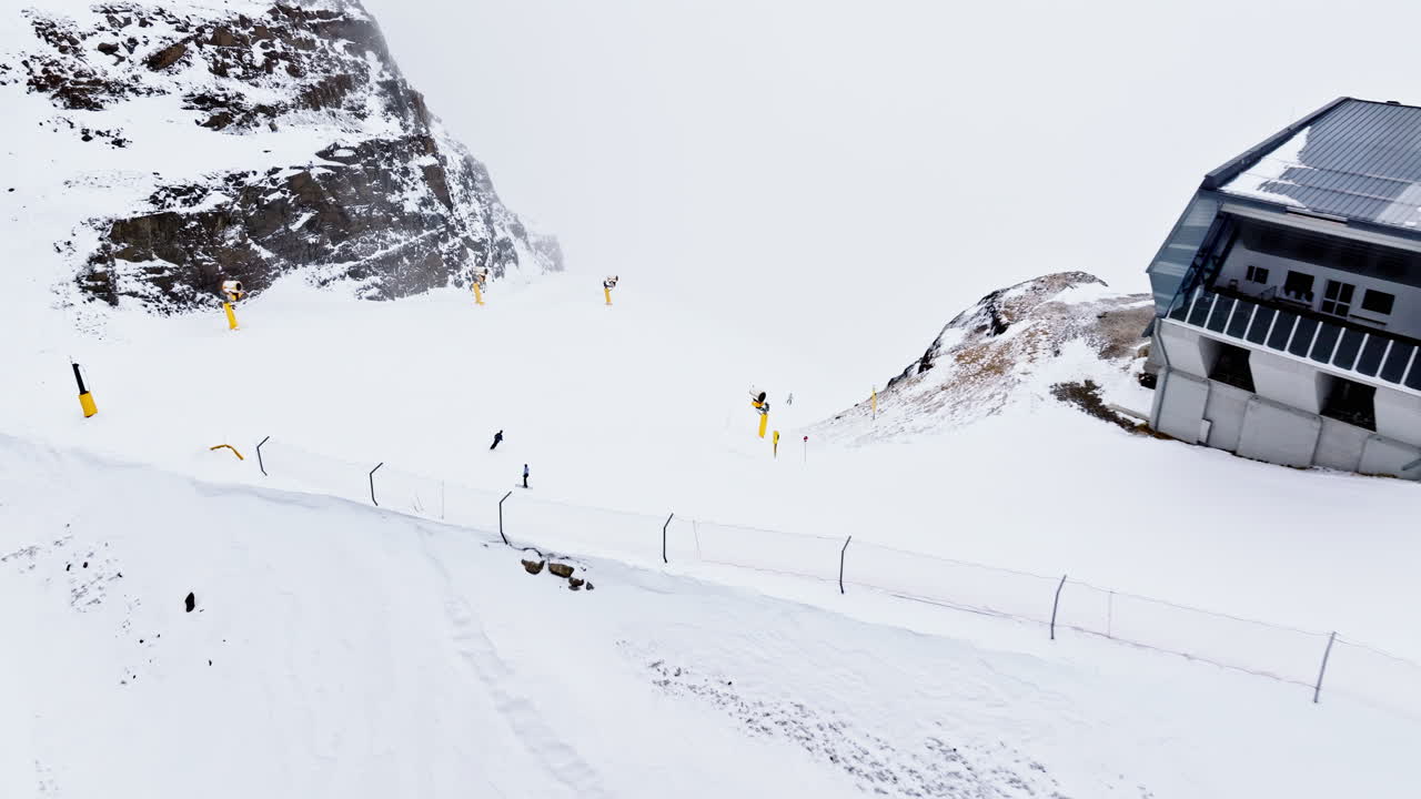 Aerial drone view of Portavescovo covered in snow, in Arabba, Italy