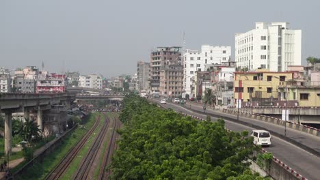 urban cityscape in bangladesh with railway and overpass