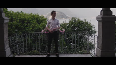 Man on a Balcony with a View