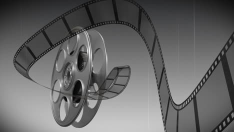 carrete de película contra un fondo en blanco y negro