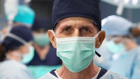 portrait of mature surgeon at operating room